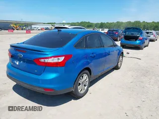 2012 Ford Focus SE with VIN 1FAHP3F28CL167157, listed as a IAAI auction lot 42381139 with 170,694 mi miles and . Bid and sale history available at DreamBid. Image 4.
