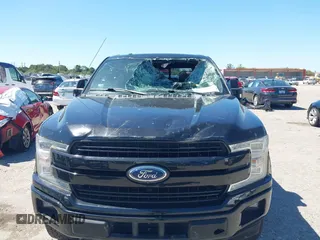 2018 Ford F-150 XL with VIN 1FTFW1EG9JFC63669, listed as a IAAI auction lot 41748012 with 143,584 mi miles. Bid and sale history available at carsss.com. Image 6.