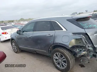 2021 Cadillac XT5 FWD Premium Luxury with VIN 1GYKNCRS5MZ128908, listed as a IAAI auction lot 41919571 with 51,280 mi miles and . Bid and sale history available at carsss.com. Image 15.