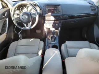 2014 Mazda CX-5 Grand Touring with VIN JM3KE4DY1E0405493, listed as a Copart auction lot 41688915 with 94,970 mi miles and Salvage Title. Bid and sale history available at carsss.com. Image 8.