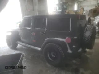 2016 Jeep Wrangler Unlimited Rubicon z VIN 1C4HJWFGXGL211657, wystawiony jako Copart lot #45135355 z przebiegiem 97 046 mil mil oraz Szkoda całkowita • Salvage title. Historia ofert i sprzedaży dostępna na DreamBid. Obrazek 2.