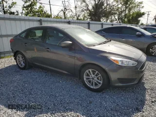 2018 Ford Focus SE with VIN 1FADP3F22JL304959, listed as a Copart auction lot 51994825 with 54,858 mi miles and Salvage Title. Bid and sale history available at DreamBid. Image 4.