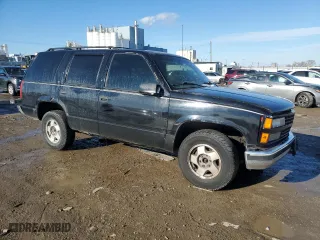 1997 Chevrolet Tahoe with VIN 1GNEK13R7VJ337340, listed as a Copart auction lot 88989435 with 208,313 mi miles and Salvage Title. Bid and sale history available at carsss.com. Image 4.