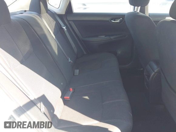 2018 Nissan Sentra S z VIN 3N1AB7AP7JY310031, wystawiony jako IAAI lot #41974445 z przebiegiem 106 842 mil mil oraz . Historia ofert i sprzedaży dostępna na DreamBid. Obrazek 8.