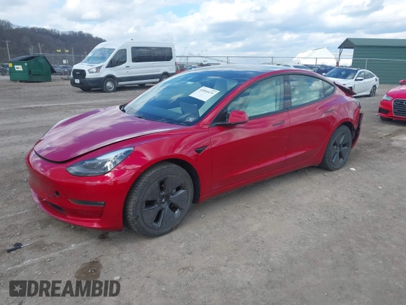 2021 Tesla Model 3 Long Range with VIN 5YJ3E1EB0MF902833, listed as a IAAI auction lot 41854474 with 41,982 mi miles and . Bid and sale history available at DreamBid. Image 2.