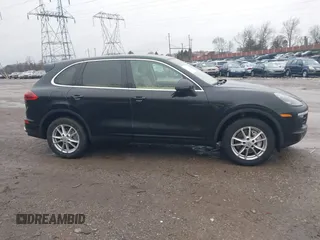 2016 Porsche Cayenne with VIN WP1AA2A28GLA06519, listed as a IAAI auction lot 41520326 with 144,828 mi miles. Bid and sale history available at carsss.com. Image 14.