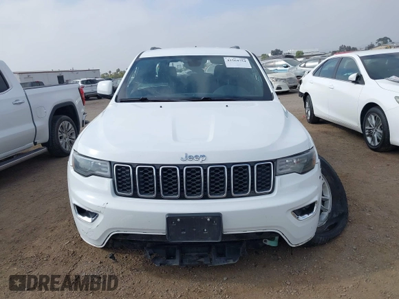 2020 Jeep Grand Cherokee Laredo E with VIN 1C4RJEAG4LC245884, listed as a IAAI auction lot 42564754 with 63,356 mi miles and . Bid and sale history available at DreamBid. Image 13.
