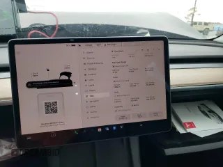 2022 Tesla Model 3 with VIN 5YJ3E1EA6NF188263, listed as a Copart auction lot 77542203 with 75,461 mi miles and Non Repairable. Bid and sale history available at DreamBid. Image 9.