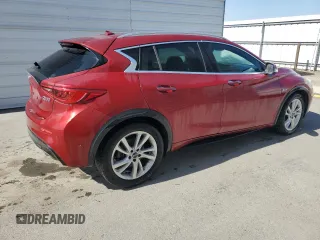 2017 Infiniti QX30 Premium z VIN SJKCH5CP5HA036085, wystawiony jako Copart lot #51936665 z przebiegiem 74 876 mil mil oraz Tytuł czysty. Historia ofert i sprzedaży dostępna na DreamBid. Obrazek 3.