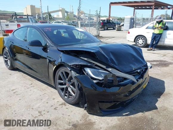 2022 Tesla Model S Plaid with VIN 5YJSA1E61NF483354, listed as a IAAI auction lot 41973636 with 32,541 mi miles and . Bid and sale history available at DreamBid. Image 1.