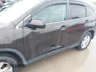 2014 Honda CR-V EX-L z VIN 5J6RM4H76EL037154, wystawiony jako IAAI lot #42449866 z przebiegiem 92 127 mil mil oraz . Historia ofert i sprzedaży dostępna na DreamBid. Obrazek 6.