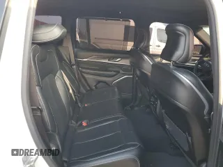 2023 Jeep Grand Cherokee Overland with VIN 1C4RJHDG8PC502208, listed as a Copart auction lot 86927734 with 53,732 mi miles and Salvage title. Bid and sale history available at DreamBid. Image 11.