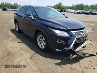 2017 Lexus RX 350 with VIN 2T2BZMCA3HC092809, listed as a Copart auction lot 61770475 with 106,732 mi miles and Salvage title. Bid and sale history available at DreamBid. Image 4.
