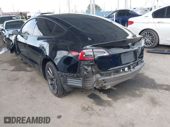 2023 Tesla Model 3 z VIN 5YJ3E1EA1PF546324, wystawiony jako IAAI lot #42103745 z przebiegiem 33 284 mil mil oraz . Historia ofert i sprzedaży dostępna na DreamBid. Obrazek 3.
