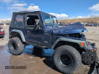 1997 Jeep Wrangler SE z VIN 1J4FY29P1VP441353, wystawiony jako Copart lot #51691545 z przebiegiem Nie podano mil oraz Szkoda całkowita • Salvage title. Historia ofert i sprzedaży dostępna na DreamBid. Obrazek 4.