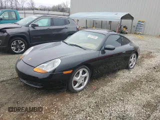 1999 Porsche 911 with VIN WP0AA2990XS623681, listed as a Copart auction lot 49123345 with Not Provided miles and Salvage Title. Bid and sale history available at DreamBid. Image 1.