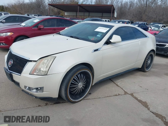 2011 Cadillac CTS Performance with VIN 1G6DJ1ED3B0142767, listed as a IAAI auction lot 41676404 with 238,027 mi miles and . Bid and sale history available at DreamBid. Image 2.