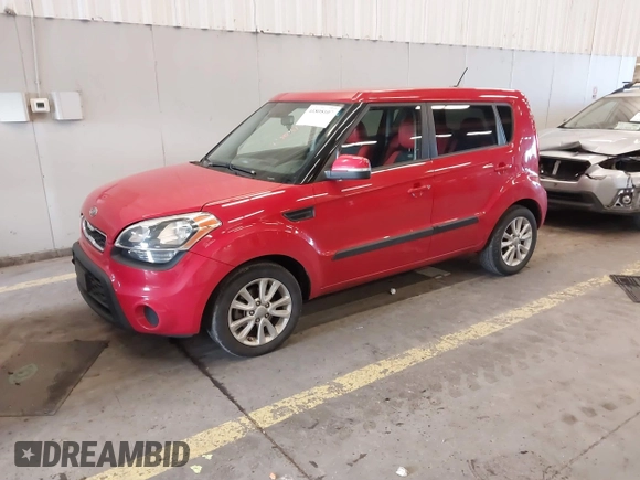 2012 Kia Soul + with VIN KNDJT2A6XC7385962, listed as a IAAI auction lot 41808107 with 115,361 mi miles. Bid and sale history available at carsss.com. Image 2.