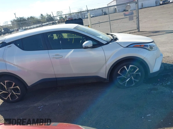 2018 Toyota C-HR XLE with VIN JTNKHMBX3J1011066, listed as a IAAI auction lot 41902651 with 66,874 mi miles. Bid and sale history available at carsss.com. Image 13.