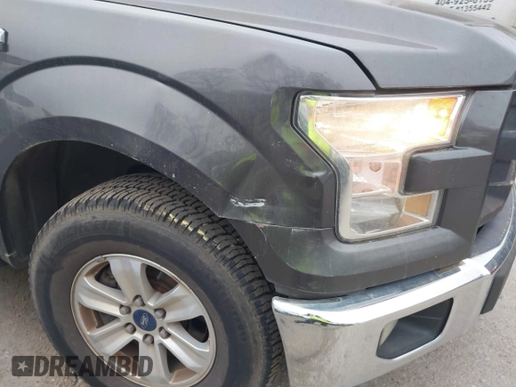 2015 Ford F-150 XL with VIN 1FTEW1CF4FFA75879, listed as a IAAI auction lot 41923278 with 198,146 mi miles and . Bid and sale history available at DreamBid. Image 6.