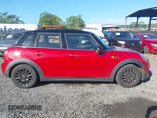 2015 MINI Hardtop 4 Door z VIN WMWXS5C57F2C63418, wystawiony jako IAAI lot #41938785 z przebiegiem 101 712 mil mil oraz . Historia ofert i sprzedaży dostępna na DreamBid. Obrazek 13.