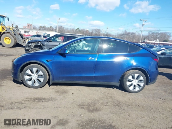 2021 Tesla Model Y Long Range with VIN 5YJYGDEE8MF293230, listed as a IAAI auction lot 41744033 with 56,797 mi miles and . Bid and sale history available at DreamBid. Image 14.