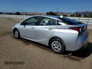 2022 Toyota Prius L Eco с VIN JTDKAMFU1N3177721, выставлен на аукционе Copart как лот 62401865 с пробегом 74 785 миль миль и Списание • Salvage title. История ставок и продаж доступна на DreamBid. Изображение 2.