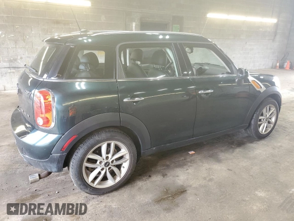 2014 MINI Countryman with VIN WMWZB3C58EWR37237, listed as a Copart auction lot 55596935 with 127,458 mi miles and Salvage Title. Bid and sale history available at DreamBid. Image 3.