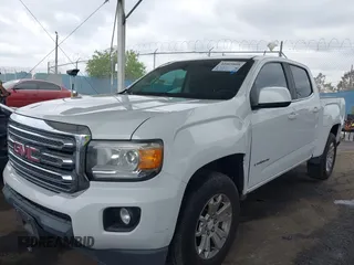 2015 GMC Canyon 2WD SLE with VIN 1GTG5BE31F1177142, listed as a IAAI auction lot 42065808 with 117,237 mi miles and . Bid and sale history available at DreamBid. Image 2.