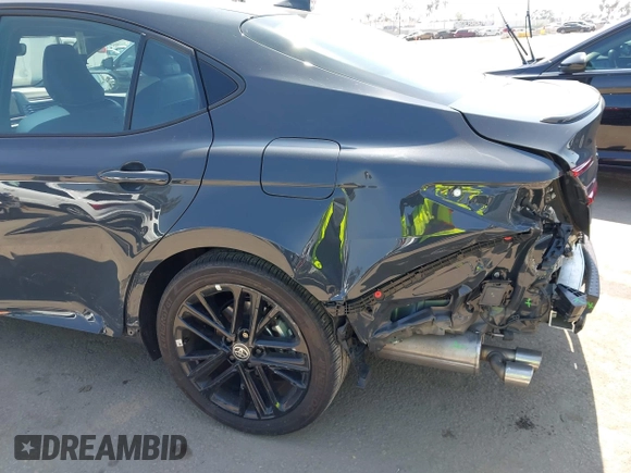 2025 Toyota Camry LE z VIN 4T1DAACK7SU531768, wystawiony jako IAAI lot #42187559 z przebiegiem 26 348 mil mil oraz . Historia ofert i sprzedaży dostępna na DreamBid. Obrazek 18.