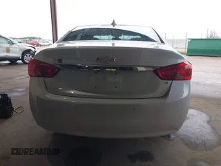 2016 Chevrolet Impala LT with VIN 2G1105SA6G9146418, listed as a IAAI auction lot 41608724 with 124,915 mi miles and . Bid and sale history available at DreamBid. Image 16.