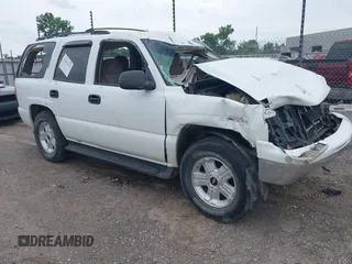 2002 Chevrolet Tahoe LT with VIN 1GNEC13Z52J341962, listed as a IAAI auction lot 42391522 with 239,452 mi miles and . Bid and sale history available at DreamBid. Image 1.