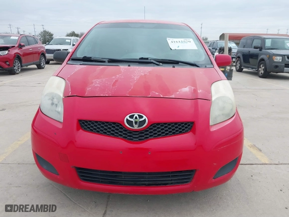 2009 Toyota Yaris with VIN JTDKT903295244022, listed as a IAAI auction lot 41615570 with 165,964 mi miles. Bid and sale history available at carsss.com. Image 12.