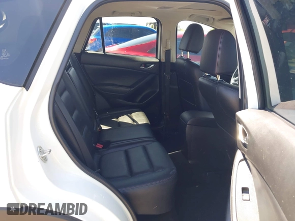 2015 Mazda CX-5 Grand Touring with VIN JM3KE2DYXF0493370, listed as a IAAI auction lot 42087156 with 161,464 mi miles. Bid and sale history available at carsss.com. Image 8.