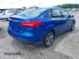 2018 Ford Focus SE with VIN 1FADP3FE8JL238024, listed as a IAAI auction lot 42463643 with Not provided miles and . Bid and sale history available at DreamBid. Image 4.