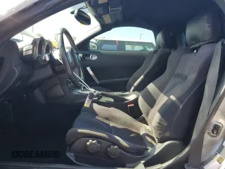 2004 Nissan 350Z Enthusiast z VIN JN1AZ36D34T110490, wystawiony jako Copart lot #57863915 z przebiegiem 139 757 mil mil oraz Szkody całkowita. Historia ofert i sprzedaży dostępna na DreamBid. Obrazek 7.