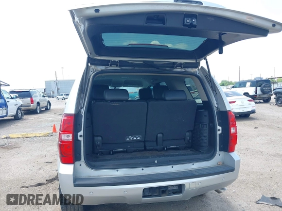 2013 Chevrolet Tahoe LT with VIN 1GNSCBE09DR357304, listed as a IAAI auction lot 42361887 with 96,229 mi miles and . Bid and sale history available at DreamBid. Image 21.