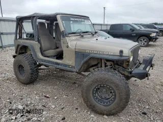 2004 Jeep Wrangler Rubicon with VIN 1J4FA69S94P774219, listed as a Copart auction lot 62806594 with 121,819 mi miles and Salvage Title. Bid and sale history available at carsss.com. Image 4.