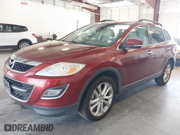 2012 Mazda CX-9 Grand Touring z VIN JM3TB3DAXC0363848, wystawiony jako IAAI lot #42217049 z przebiegiem 203 071 mil mil oraz . Historia ofert i sprzedaży dostępna na DreamBid. Obrazek 2.