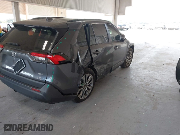 2022 Toyota RAV4 XLE Premium with VIN 2T3C1RFV8NC192497, listed as a IAAI auction lot 42336051 with 91,547 mi miles and . Bid and sale history available at DreamBid. Image 4.