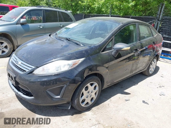 2013 Ford Fiesta SE z VIN 3FADP4BJ7DM144261, wystawiony jako IAAI lot #42281950 z przebiegiem 149 437 mil mil oraz . Historia ofert i sprzedaży dostępna na DreamBid. Obrazek 2.
