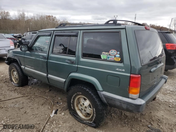 2000 Jeep Cherokee Police with VIN 1J4FF48SXYL244524, listed as a Copart auction lot 81164034 with 104,180 mi miles and Clean Title. Bid and sale history available at carsss.com. Image 2.