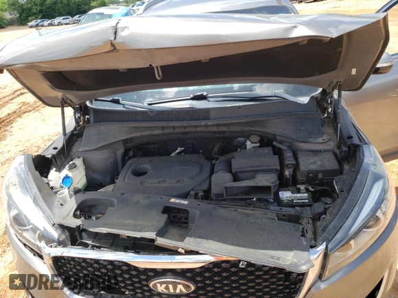 2017 Kia Sorento LX z VIN 5XYPG4A35HG297508, wystawiony jako Copart lot #56898275 z przebiegiem 137 498 mil mil oraz Szkoda całkowita • Salvage title. Historia ofert i sprzedaży dostępna na DreamBid. Obrazek 12.