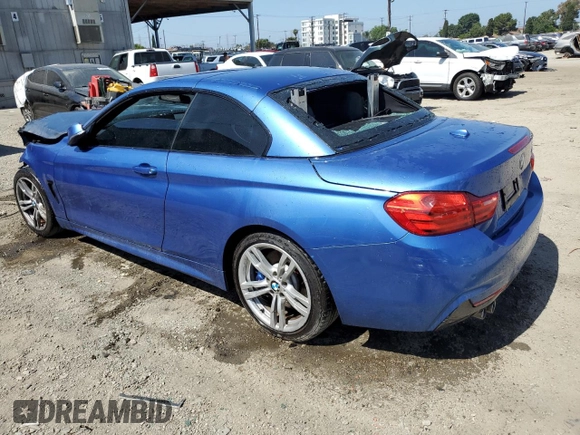 2014 BMW 4 Series 428i with VIN WBA3V7C54EP771068, listed as a Copart auction lot 61485295 with 142,300 mi miles and Salvage title. Bid and sale history available at DreamBid. Image 2.