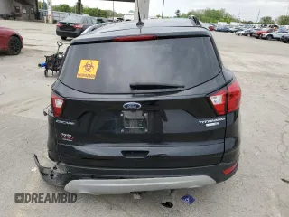 2019 Ford Escape Titanium с VIN 1FMCU9J92KUA82033, выставлен на аукционе Copart как лот 56686235 с пробегом Не указан миль и Списание • Salvage title. История ставок и продаж доступна на DreamBid. Изображение 6.