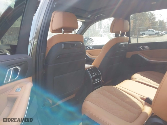2025 BMW X7 xDrive40i with VIN 5UX23EM07S9W53333, listed as a IAAI auction lot 41651402 with 6,591 mi miles. Bid and sale history available at carsss.com. Image 8.