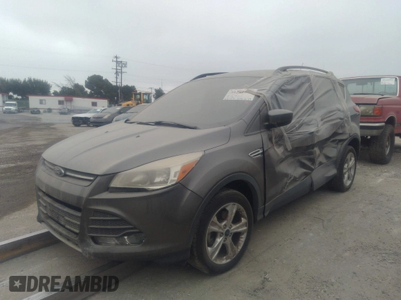2014 Ford Escape SE with VIN 1FMCU0GXXEUA77765, listed as a IAAI auction lot 40158558 with 88,373 mi miles. Bid and sale history available at carsss.com. Image 2.