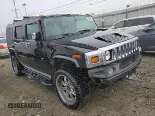 2003 Hummer H2 with VIN 5GRGN23U83H143843, listed as a Copart auction lot 43792915 with 115,569 mi miles and Salvage Title. Bid and sale history available at carsss.com. Image 4.