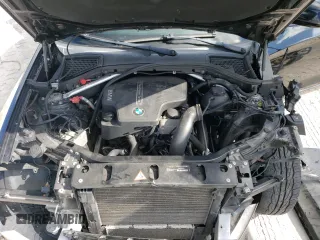 2015 BMW X4 xDrive28i with VIN 5UXXW3C50F0M87505, listed as a Copart auction lot 62977803 with 115,754 mi miles. Bid and sale history available at carsss.com. Image 11.