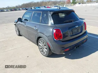 2015 MINI Hardtop 4 Door S with VIN WMWXU3C57FT892179, listed as a IAAI auction lot 42092010 with 95,156 mi miles and . Bid and sale history available at DreamBid. Image 3.